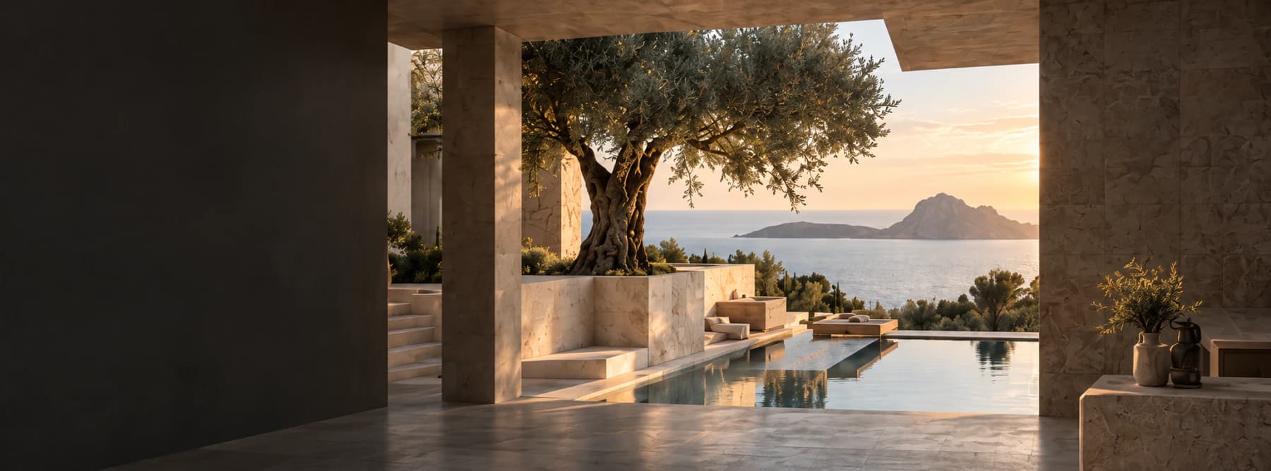Offener Natursteinraum mit altem Olivenbaum, Infinity-Pool und Blick auf Es Vedrà
